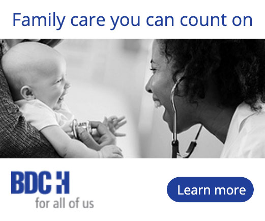 Beaver Dam Community Hospital print ad of a nurse looking at a smiling baby; Family care you can count on