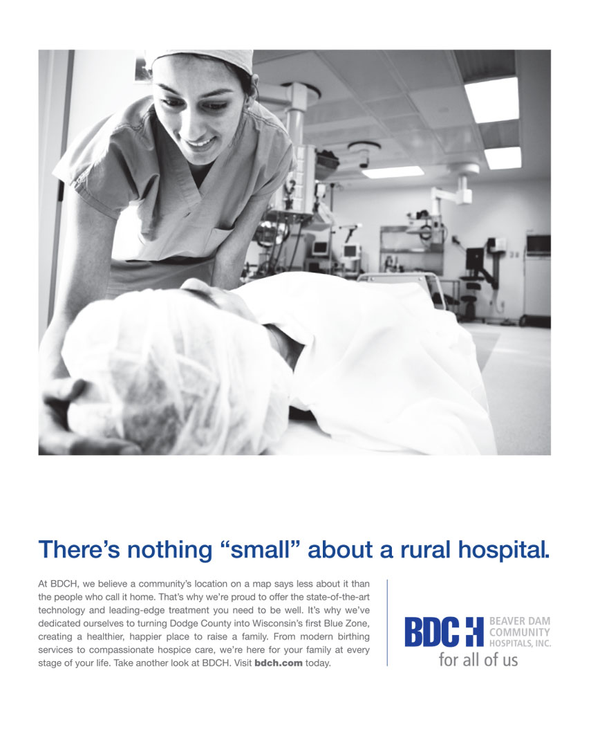 Beaver Dam Community Hospital print ad of a nurse comforting a woman going into surgery; there's nothing small about a rural hospital