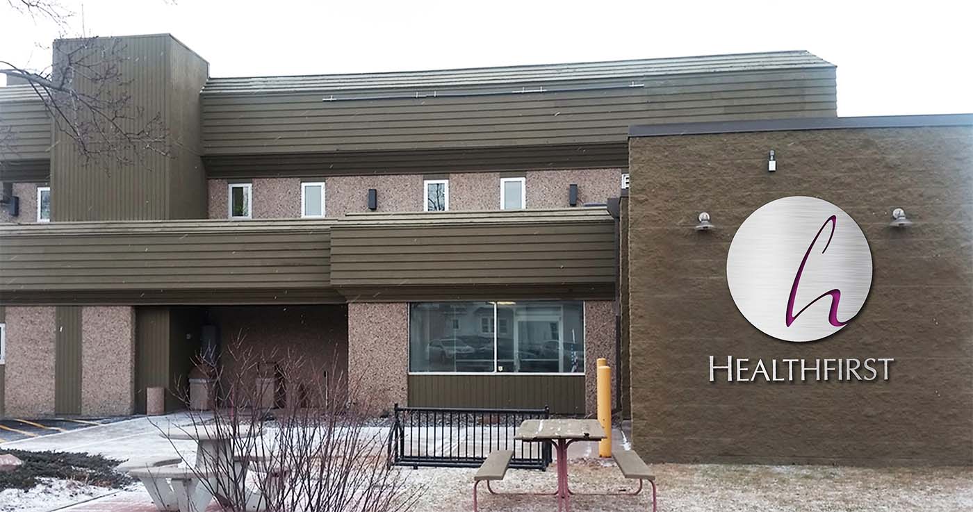 Healthfirst building with new logo on exterior