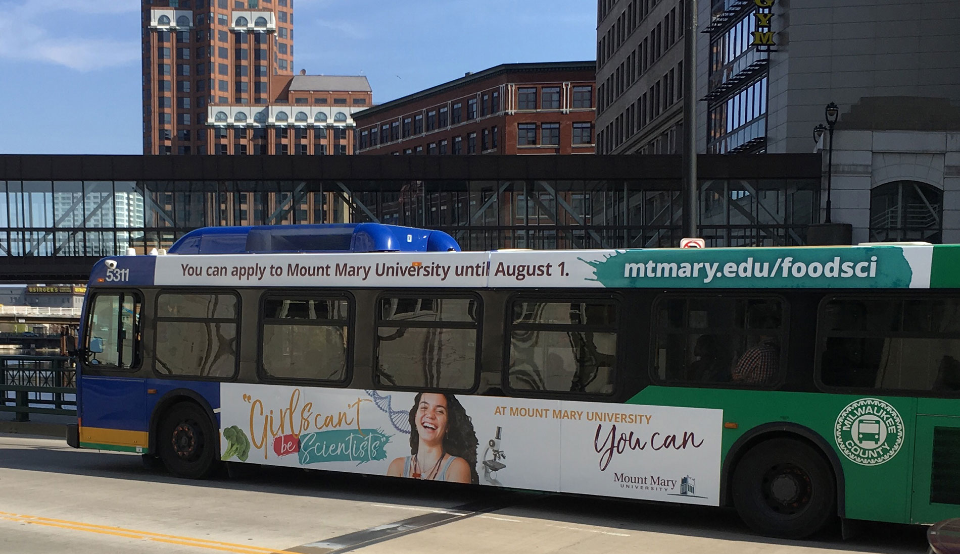 Campaign ad shown on a bus in downtown Milwaukee