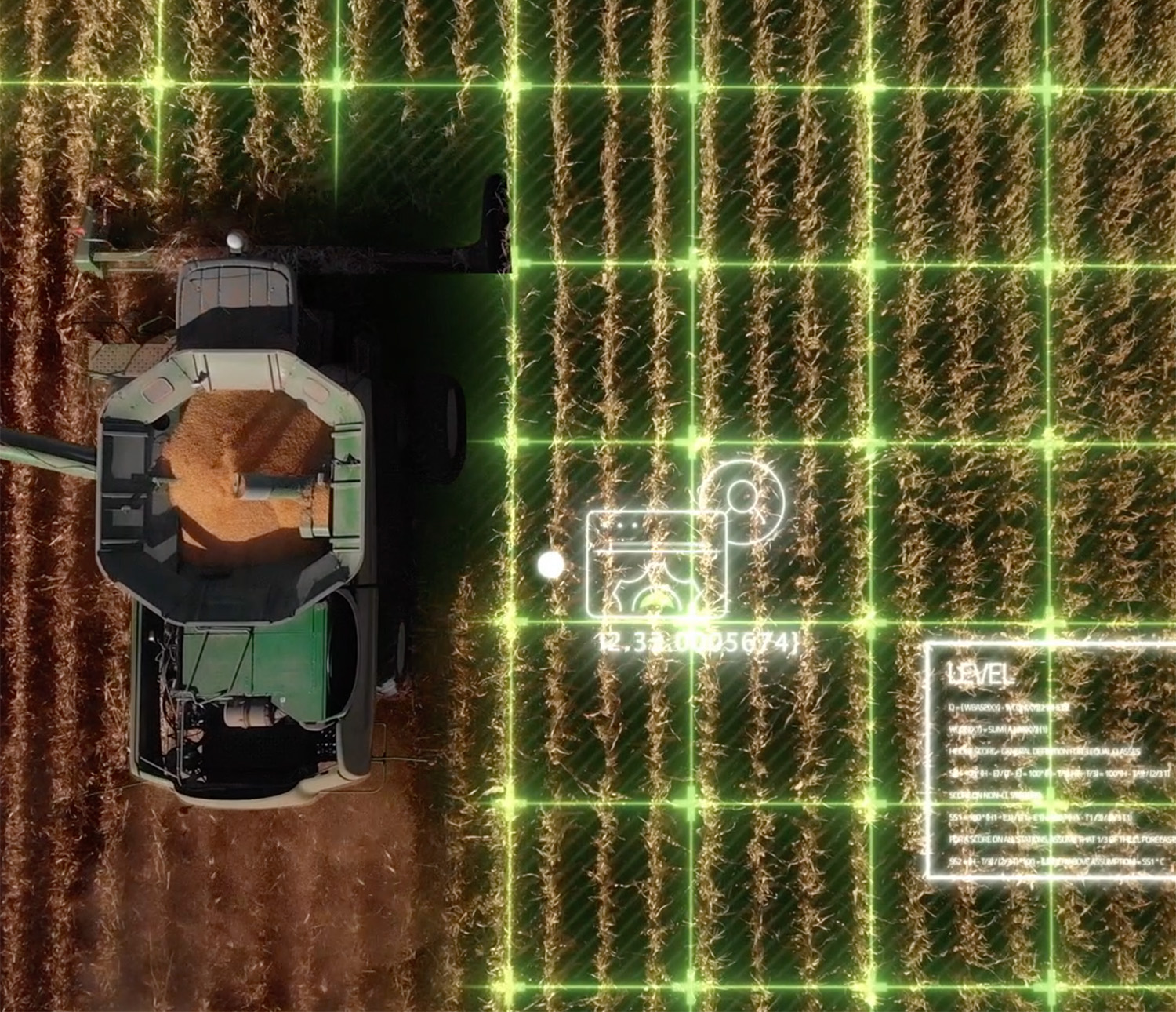 Overhead view of a piece of farming equipment next to a digital overlay on a crop field