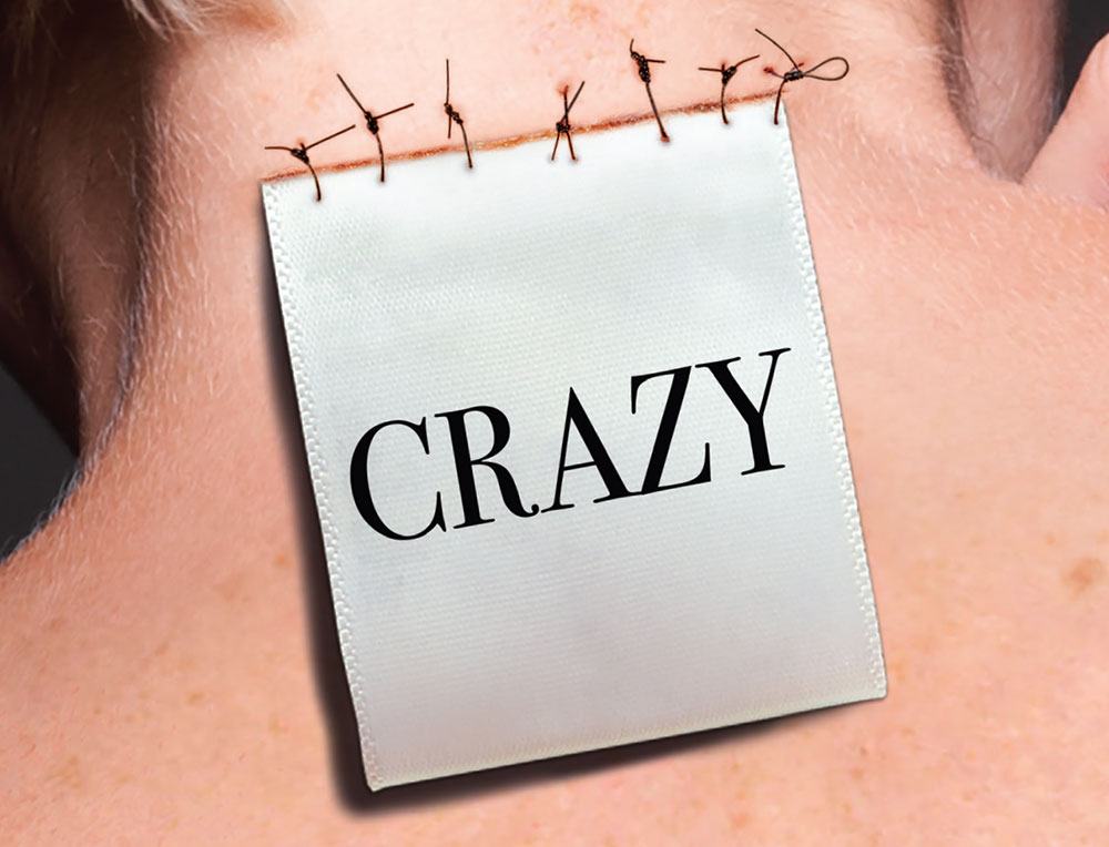 label saying crazy attached to a woman's neck